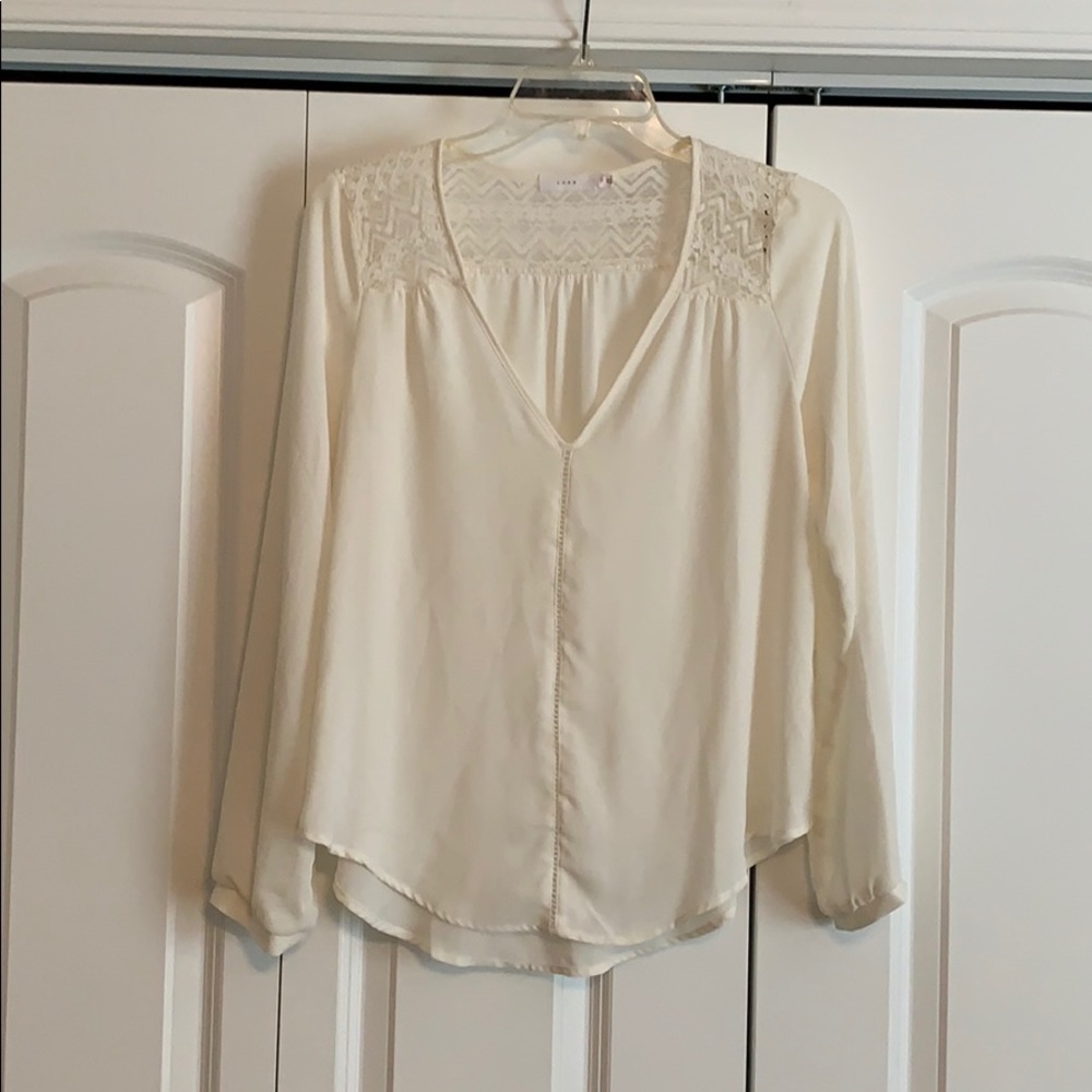 Ivory, long sleeve blouse.